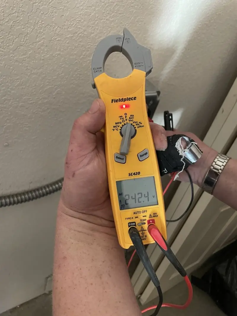 Voltage testing with clamp meter during Generator Installation in Shawnee